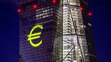 A light installation is projected onto the building of the European Central Bank during a rehearsal in Frankfurt, Germany, Dec. 30, 2021. 