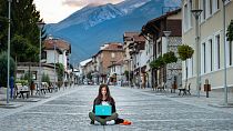 Digital nomads travel from location to location working remotely using technology and the internet. 