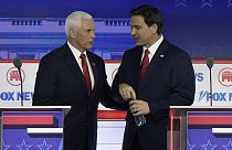 Republican primary candidates Mike Pence and Ron DeSantis at the first televised debate in Milwaukee, Wisconsin, on 23 August 2023.