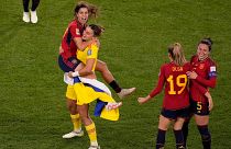 Alba Redondo, Misa Rodriguez, Olga Carmona and Ivana Andres celebrate after defeating England during the Women's World Cup soccer final at Stadium Australia in Sydney.
