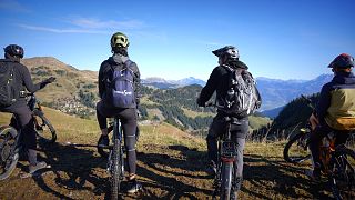 Trail runners and electric mountain bikers keep the Alps in business