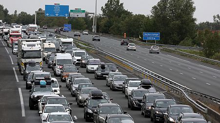 Motorists drive on the A10 motorway between Saint-Andre-de-Cubzac and Bordeaux, 5 August 2023